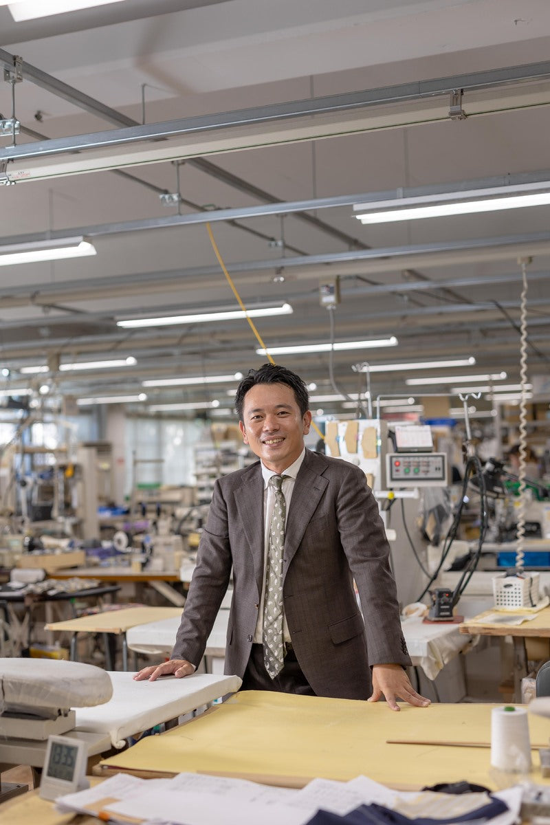 Master Tailor Nobuyuki Iwashita on the factory floor at Five One Factory